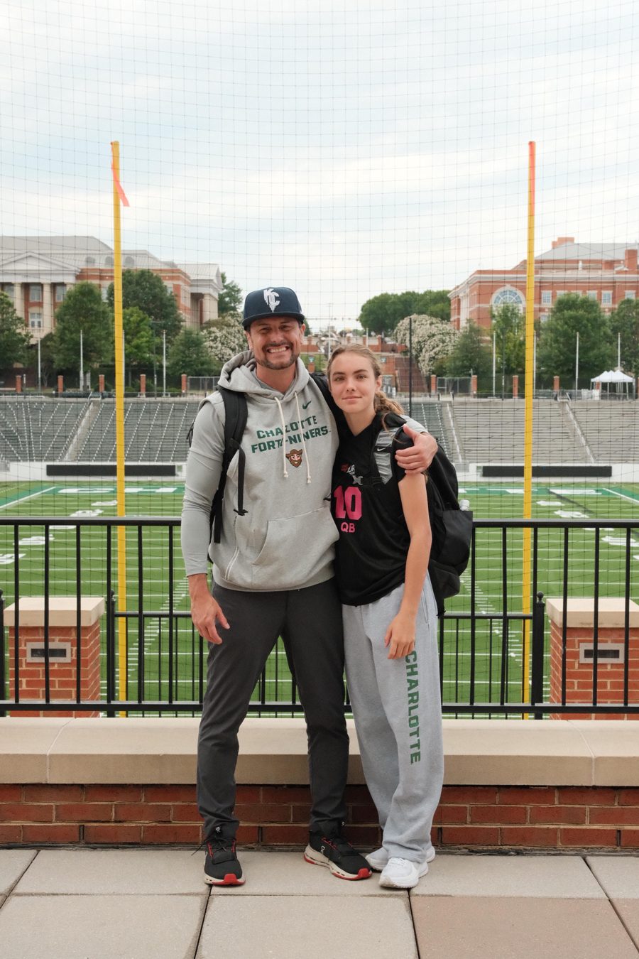 Kennedy Ford and her dad at Charlotte's football stadium